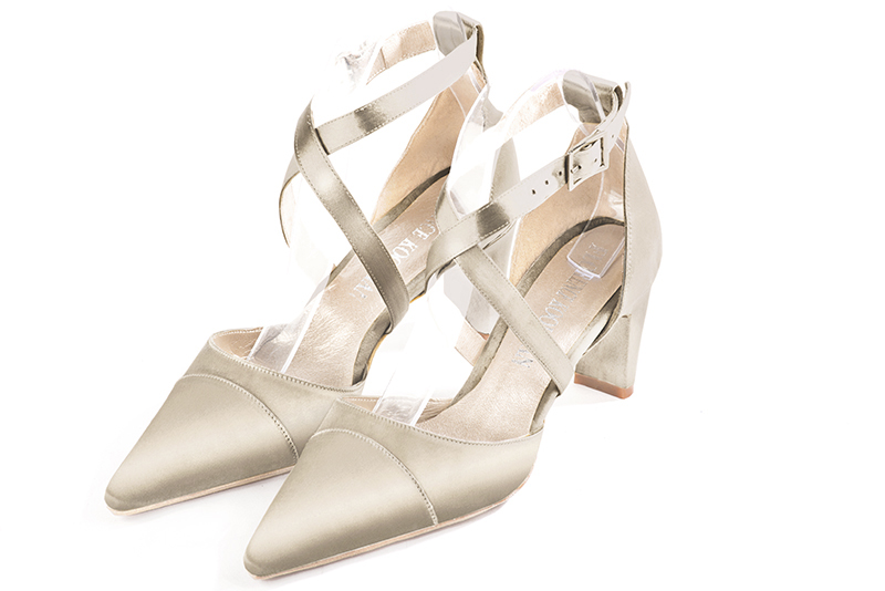 Gold women's open side shoes, with crossed straps. Pointed toe. Medium comma heels. Front view - Florence KOOIJMAN
